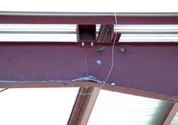 Metal building with heavy concrete walls