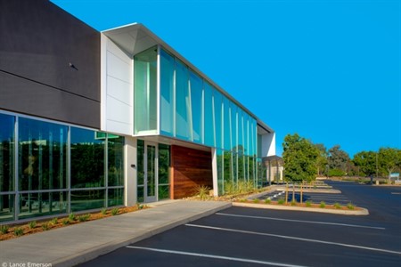 Hannah Gabriel Wells created a modern renovation design for Moda Sorrento, a four-building laboratory and office complex, with metal composite material (MCM) wall panels.