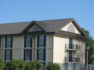 Metal roof panels were specified for Whitfield Center for Christian Leadership, School of Nursing and women's dormitory at Charleston Southern University so the design and color scheme were consistent with other campus buildings.