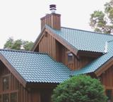 McElroy Metal's Met-Tile panels are 26-gauge Galvalume steel with a stucco embossed finish for a tile appearance.