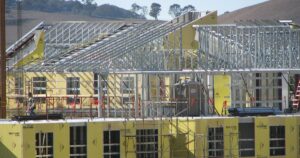 Metal Construction News file photo A steel structure, emphasizing the material's price drop despite overall increases in construction input prices.