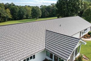 Powder-coated aluminum alloy roofing on house and attached garage
