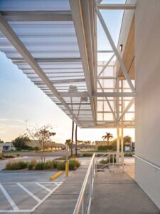 The ribbed perforated panels applied vertically and horizontally