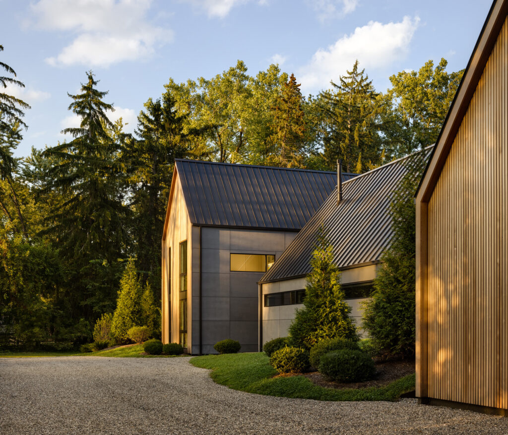 In the serene landscape of Franklin, Mich., stands a private residence seamlessly blending modern elegance with rustic charm.