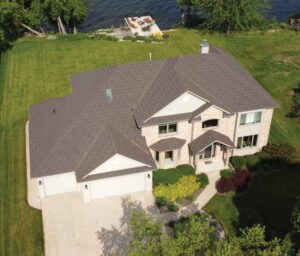 Courtesy Westlake Royal Building Products An above shot of a large home with stone-coated steel roofing.