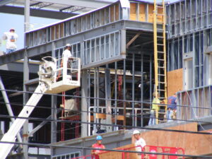 Courtesy Triangle Fastener A worksite with an employee on a lift.