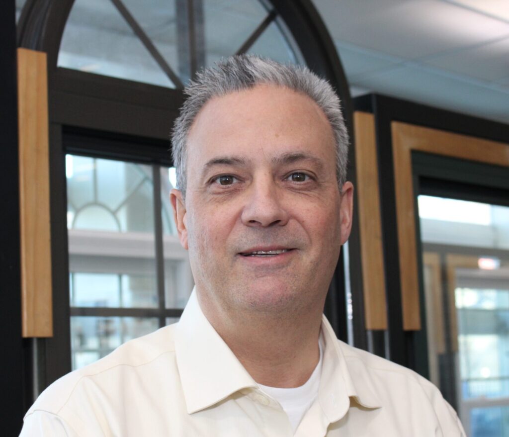 headshot of John Christie