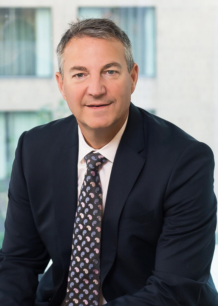 a person wearing a suit and tie