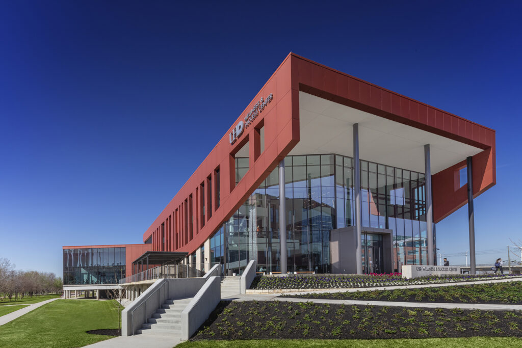 the front overhanging facade of University of Houston-Downtown (UHD) Wellness and Success Center