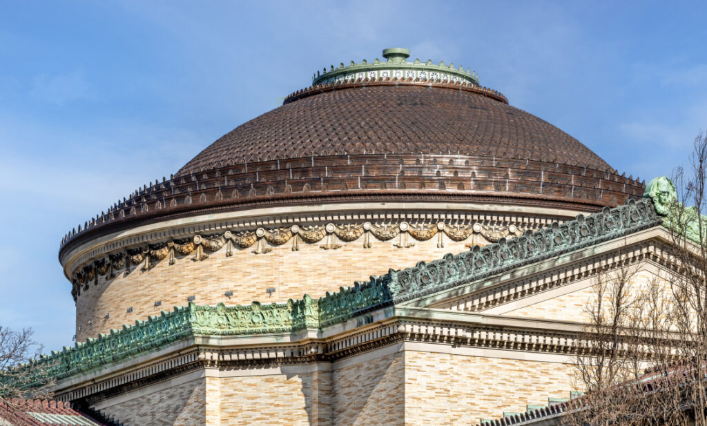 a copper dome roof on a masonry building