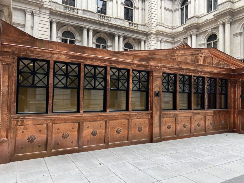 copper wall panel exterior of courtyard building