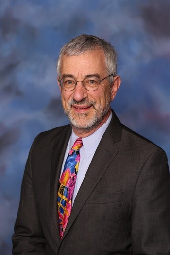 headshot of Ken Simonson