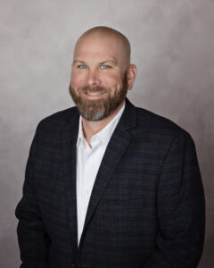 Photo courtesy MuleHide A headshot of Kevin Stanton of MuleHide in front of grey background.