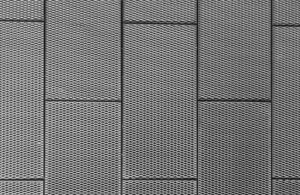 Ceiling panels installed in a brick pattern to create a unique aesthetic using expanded metal. 