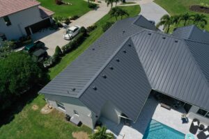 Photo courtesy Fabral/Metal Construction News file photo  A home reroofed with metal, representing results from a reroofing industry survey.