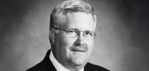 Photo courtesy NRCA A headshot of John Gooding, former National Roofing Contractors Association.