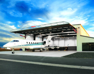 An airplane hangar with an hydraulic door. 