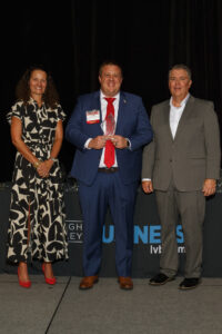 Photo courtesy ATAS International Inc. A photo of Mark Bus of ATAS accepting his Forty Under 40 award.