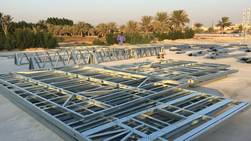 A worksite with steel framing is an example of traditional design in building construction. 