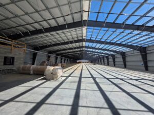 The inside of metal building currently under construction. 