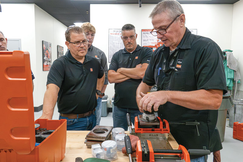 Photo courtesy FEIN A team works together to look over tools before hitting the jobsite.