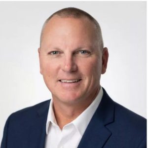 A headshot of Nevin Holly, the new president of Elevate Commercial Roofing. 