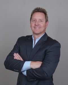 A headshot of Jacob Johnson of Apogee Architectural Metals